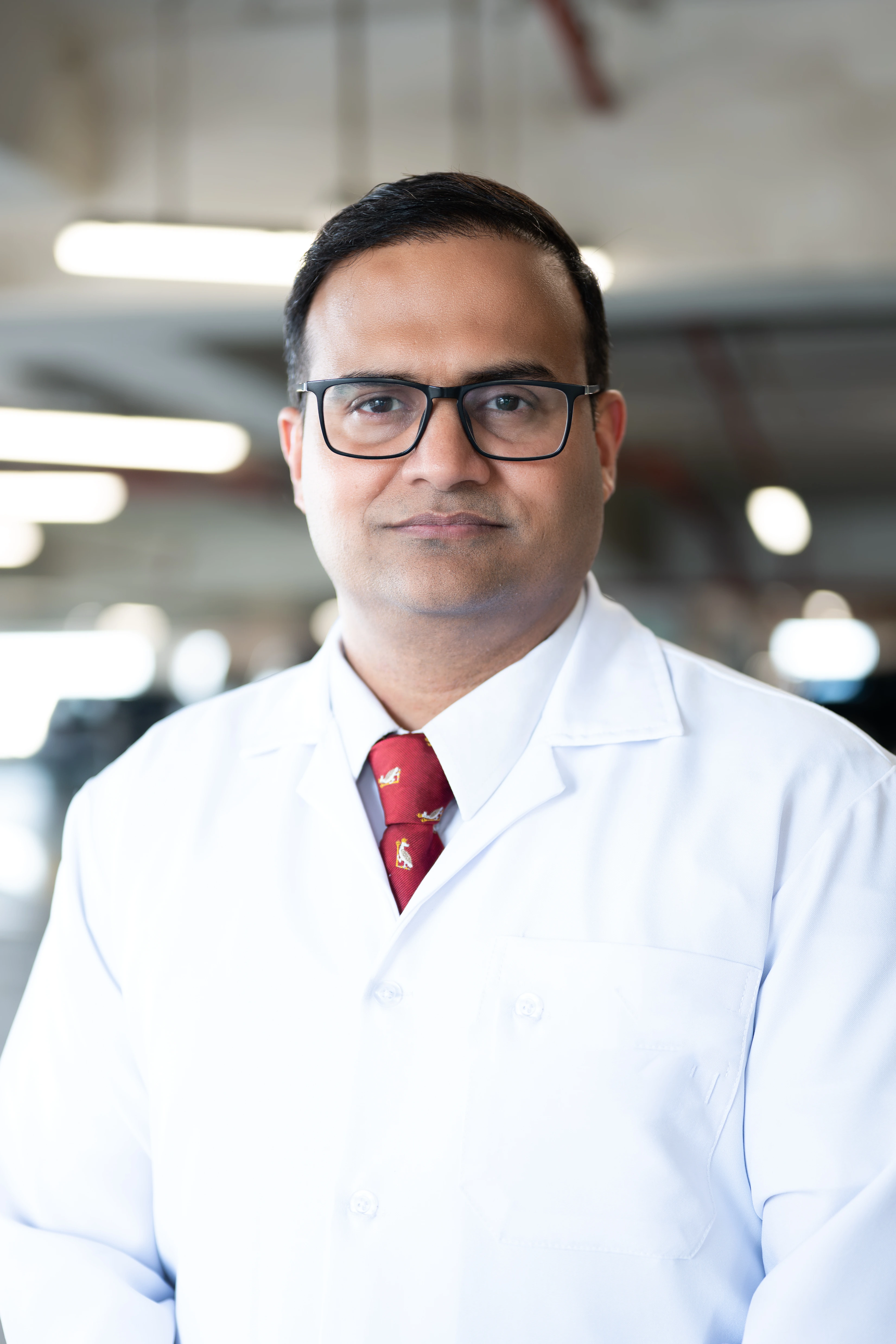 Dr. Ulhas Sonar examining patient
